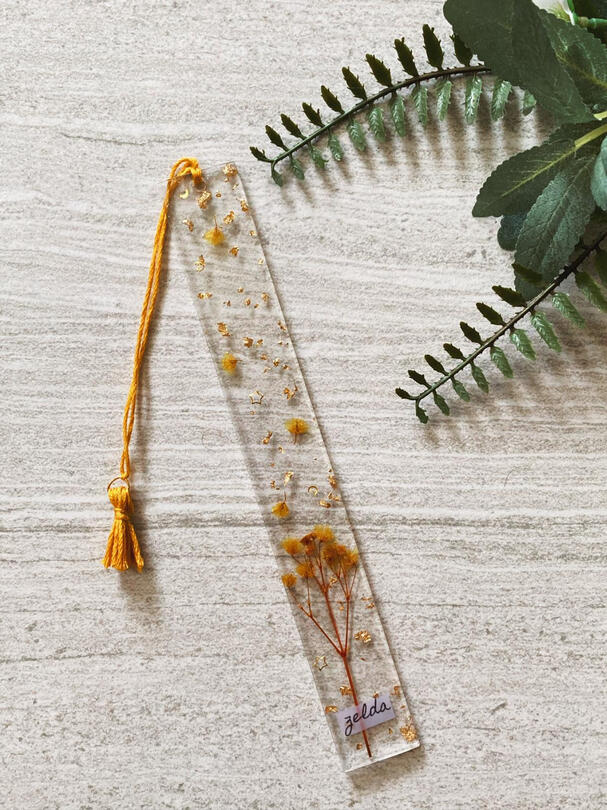 Yellowish-gold theme with gold foil flakes.